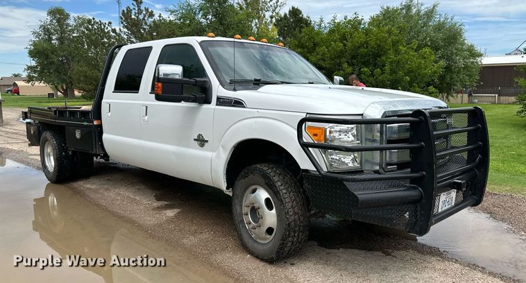 image for item KF9698 2015 Ford F350 Super Duty  Crew Cab bale bed pickup truck