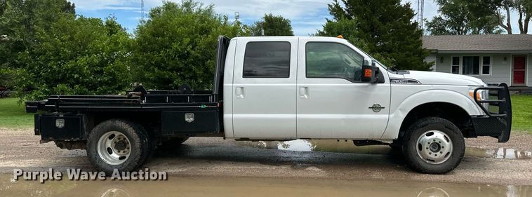 image for item KF9698 2015 Ford F350 Super Duty  Crew Cab bale bed pickup truck