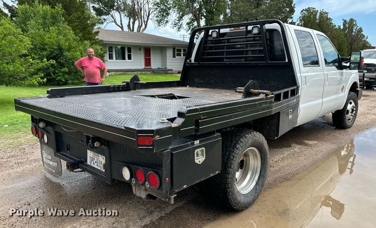 image for item KF9698 2015 Ford F350 Super Duty  Crew Cab bale bed pickup truck