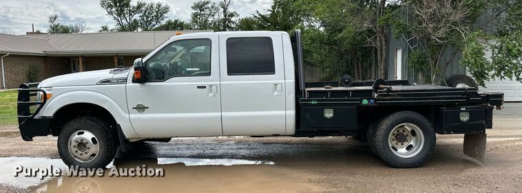 image for item KF9698 2015 Ford F350 Super Duty  Crew Cab bale bed pickup truck