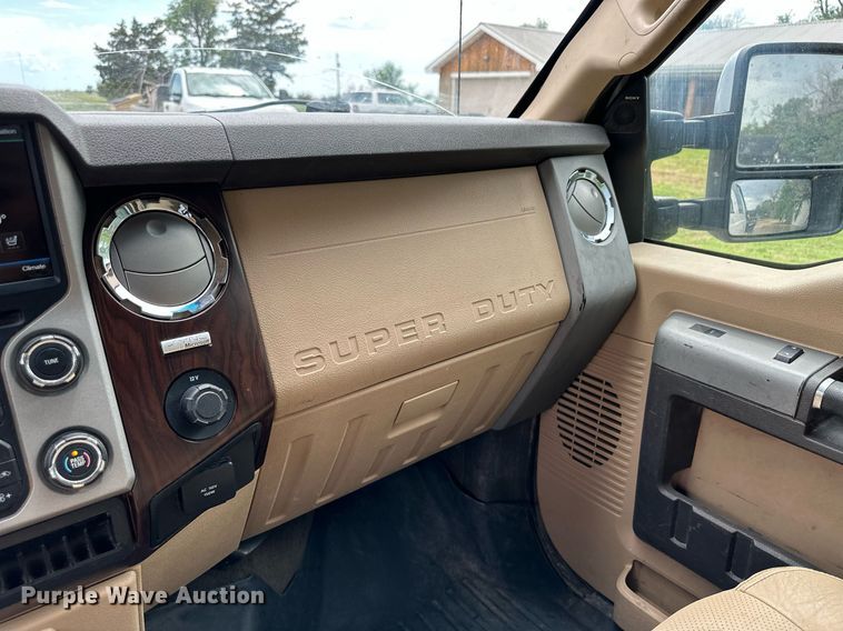 image for item KF9698 2015 Ford F350 Super Duty  Crew Cab bale bed pickup truck