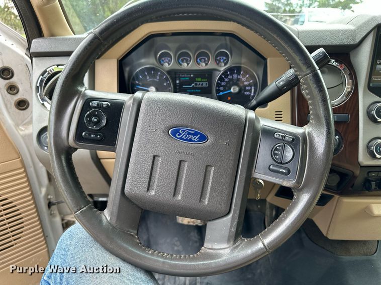 image for item KF9698 2015 Ford F350 Super Duty  Crew Cab bale bed pickup truck