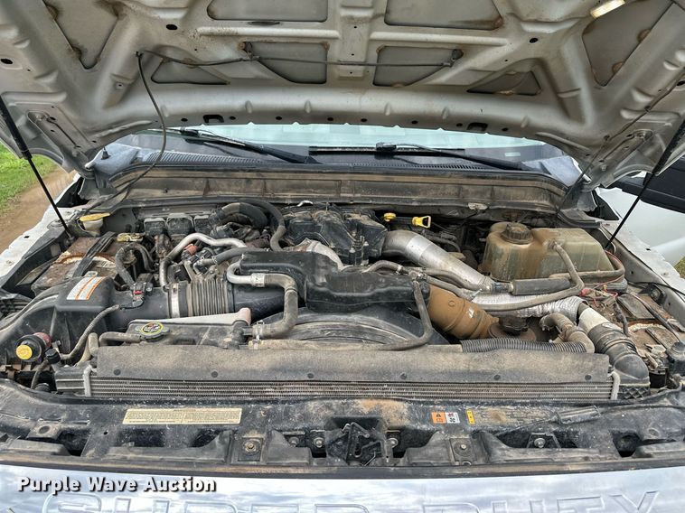 image for item KF9698 2015 Ford F350 Super Duty  Crew Cab bale bed pickup truck