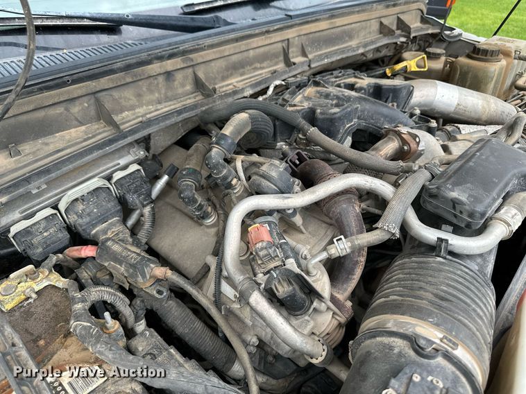 image for item KF9698 2015 Ford F350 Super Duty  Crew Cab bale bed pickup truck