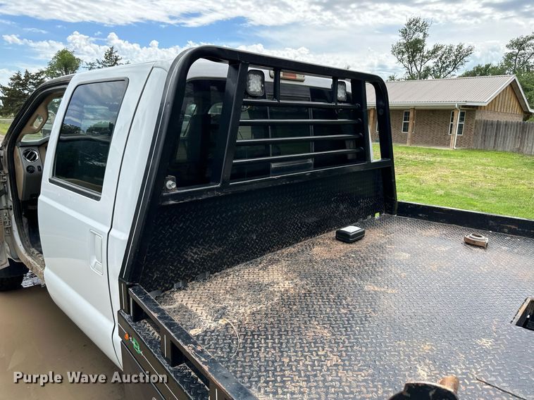 image for item KF9698 2015 Ford F350 Super Duty  Crew Cab bale bed pickup truck