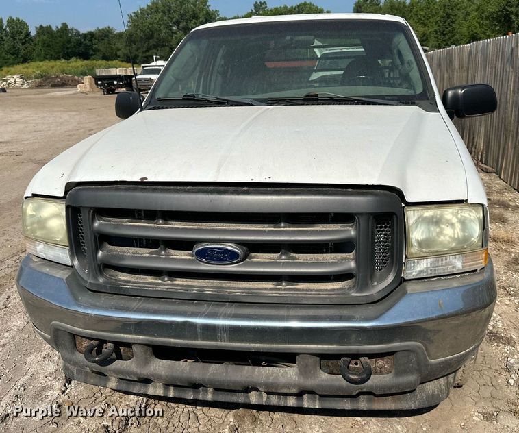 image for item LN9191 2003 Ford F250 Super Duty  SuperCab flatbed pickup truck