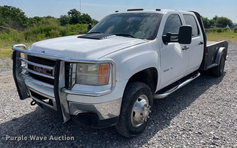 image for item NB9063 2011 GMC Sierra 3500HD  Crew Cab flatbed pickup truck