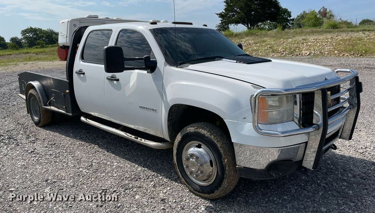 image for item NB9063 2011 GMC Sierra 3500HD  Crew Cab flatbed pickup truck