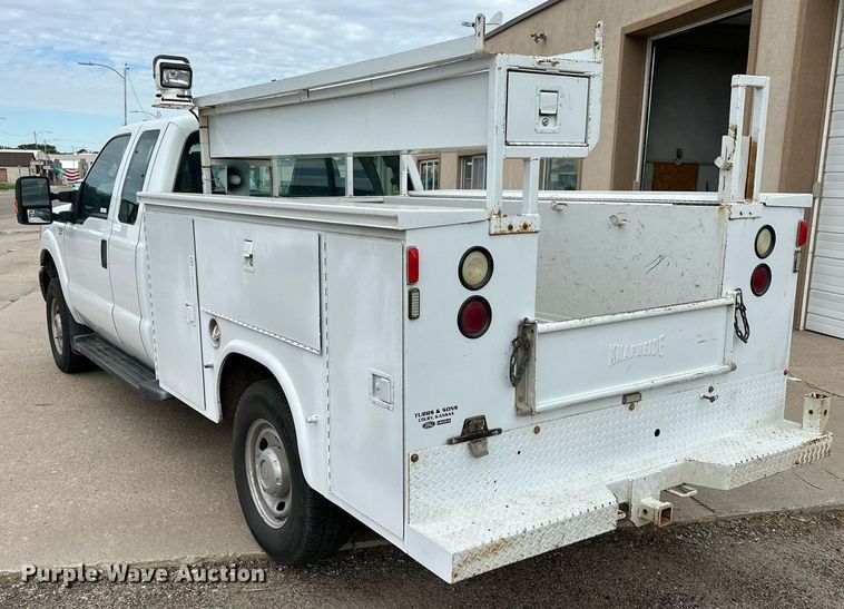 image for item NP9739 2015 Ford F250 Super Duty  SuperCab utility bed pickup truck