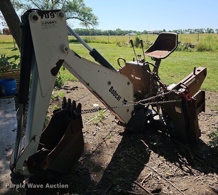 image for item NX9683 Bobcat 709FDS  skid steer backhoe