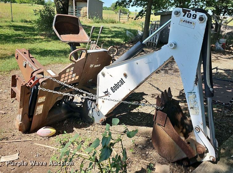 image for item NX9683 Bobcat 709FDS  skid steer backhoe