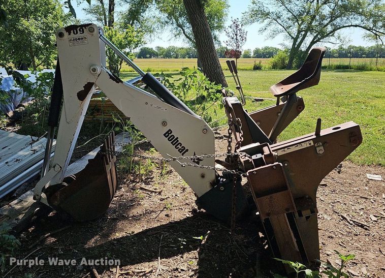 image for item NX9683 Bobcat 709FDS  skid steer backhoe
