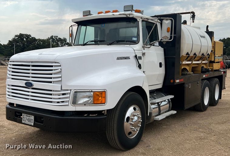 image for item DN3072 1995 Ford LTL9000  flatbed truck with mud mixing system