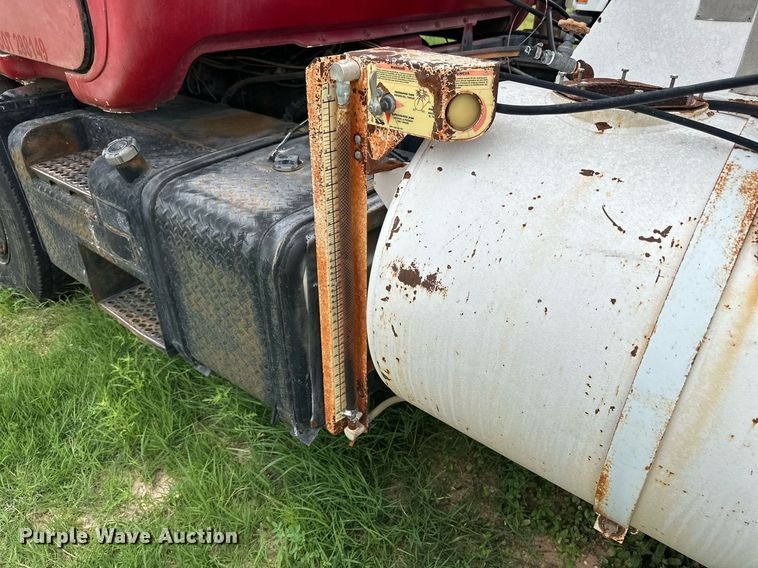 image for item KM9910 1992 Mack DM Series  ready mix truck