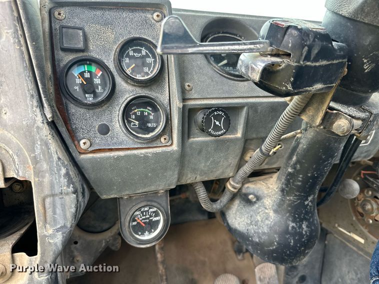 image for item KM9910 1992 Mack DM Series  ready mix truck