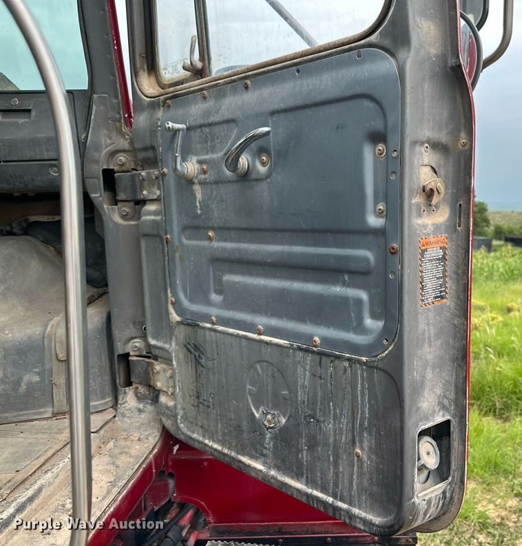 image for item KM9910 1992 Mack DM Series  ready mix truck