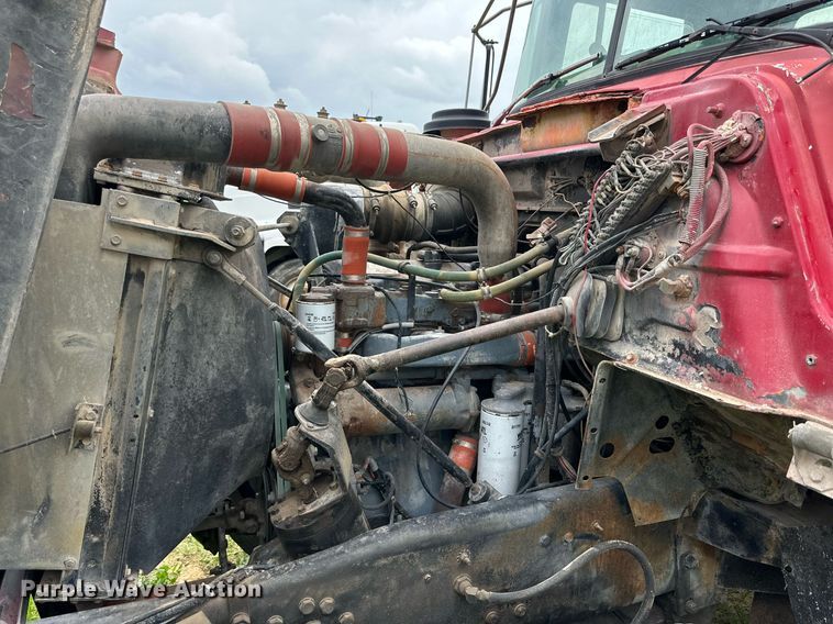 image for item KM9910 1992 Mack DM Series  ready mix truck