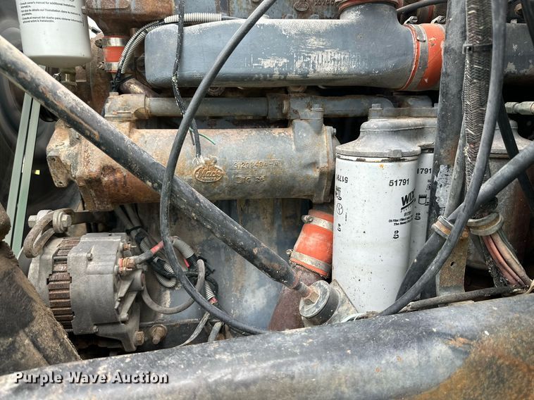 image for item KM9910 1992 Mack DM Series  ready mix truck