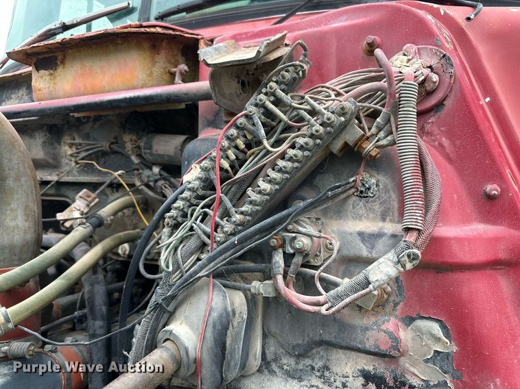 image for item KM9910 1992 Mack DM Series  ready mix truck