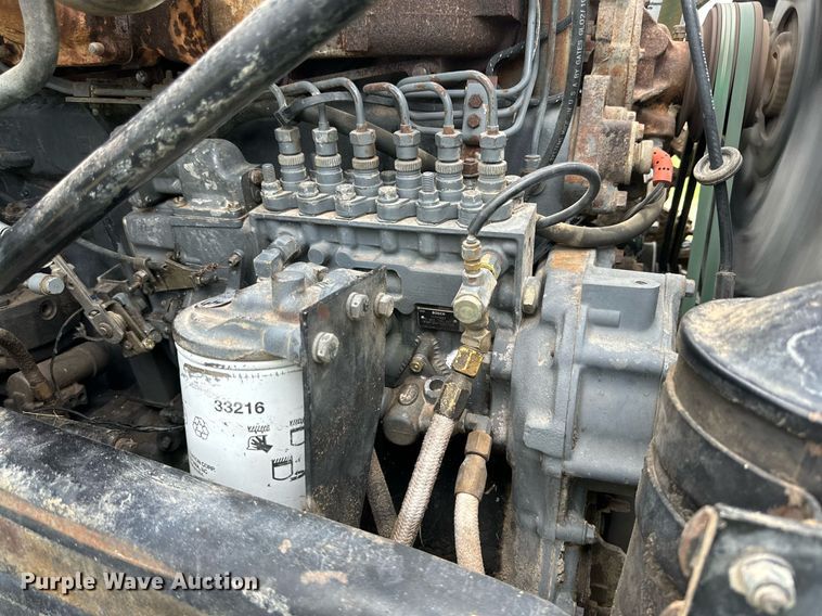 image for item KM9910 1992 Mack DM Series  ready mix truck