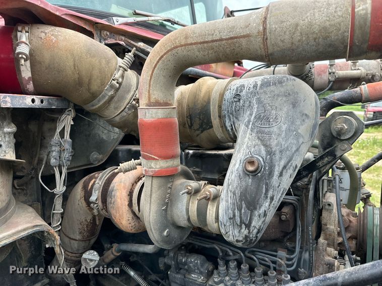 image for item KM9910 1992 Mack DM Series  ready mix truck