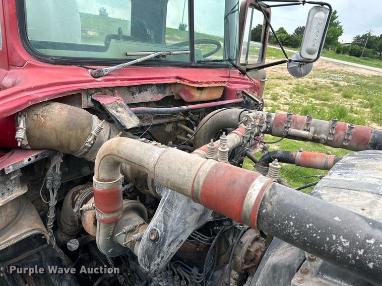 image for item KM9910 1992 Mack DM Series  ready mix truck