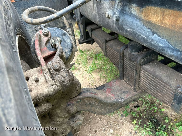 image for item KM9910 1992 Mack DM Series  ready mix truck