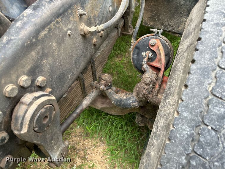 image for item KM9910 1992 Mack DM Series  ready mix truck