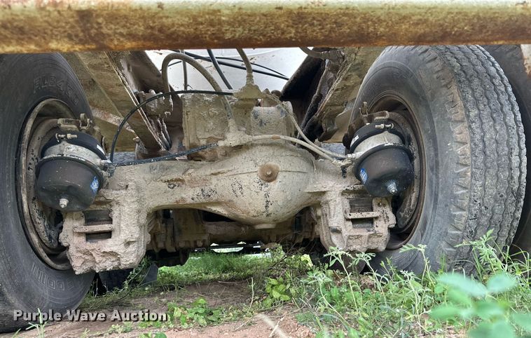 image for item KM9910 1992 Mack DM Series  ready mix truck