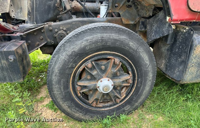 image for item KM9910 1992 Mack DM Series  ready mix truck