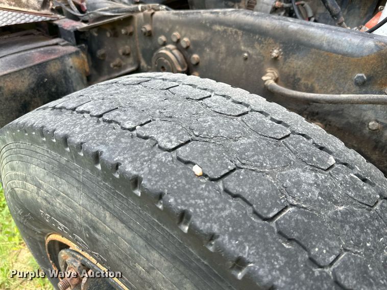 image for item KM9910 1992 Mack DM Series  ready mix truck