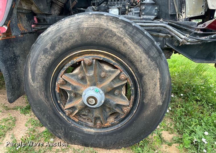 image for item KM9910 1992 Mack DM Series  ready mix truck