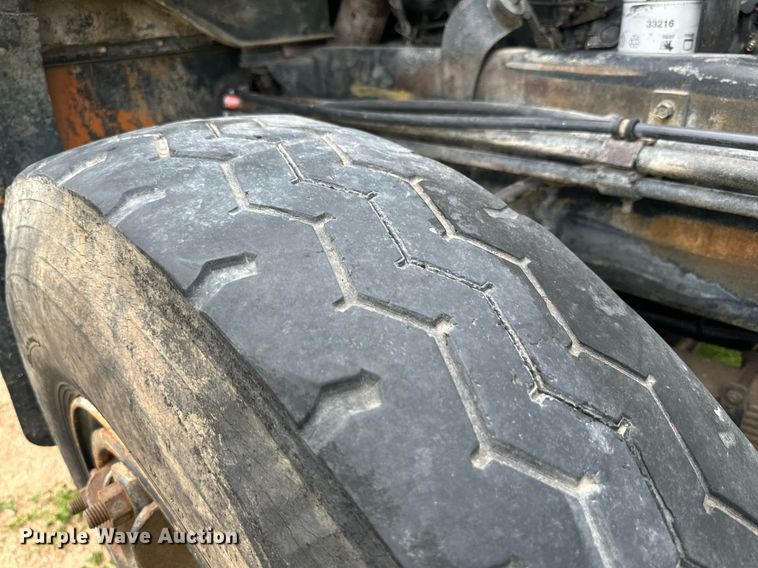 image for item KM9910 1992 Mack DM Series  ready mix truck