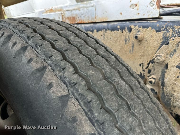 image for item KM9910 1992 Mack DM Series  ready mix truck