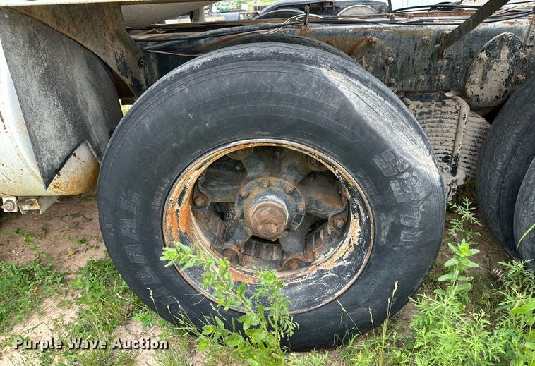 image for item KM9910 1992 Mack DM Series  ready mix truck