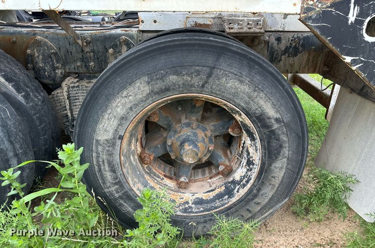 image for item KM9910 1992 Mack DM Series  ready mix truck