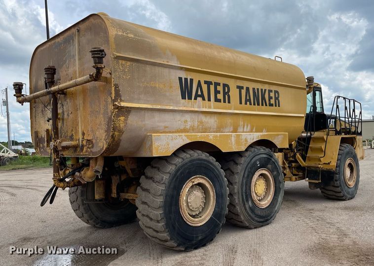 image for item LS9332 2000 Caterpillar D300E Series II  water wagon