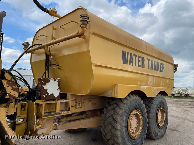 image for item LS9332 2000 Caterpillar D300E Series II  water wagon