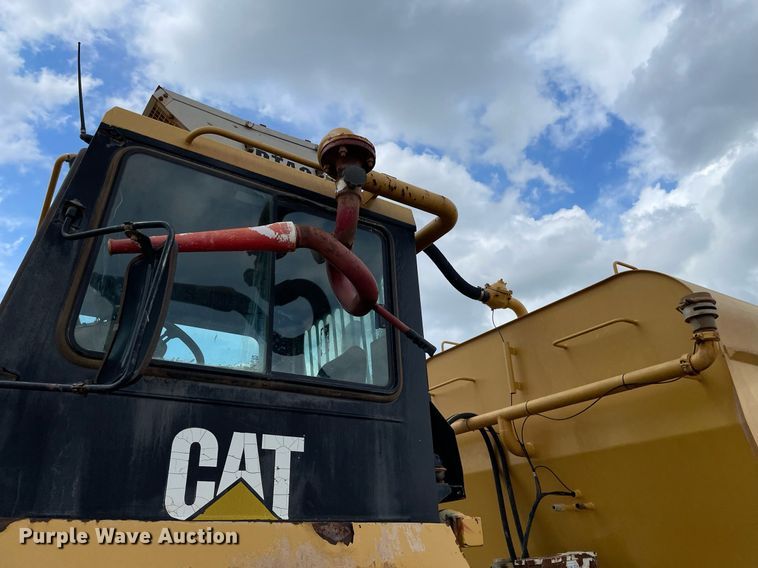 image for item LS9332 2000 Caterpillar D300E Series II  water wagon