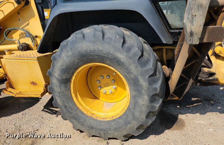 image for item MY9015 1998 John Deere 310SE  backhoe