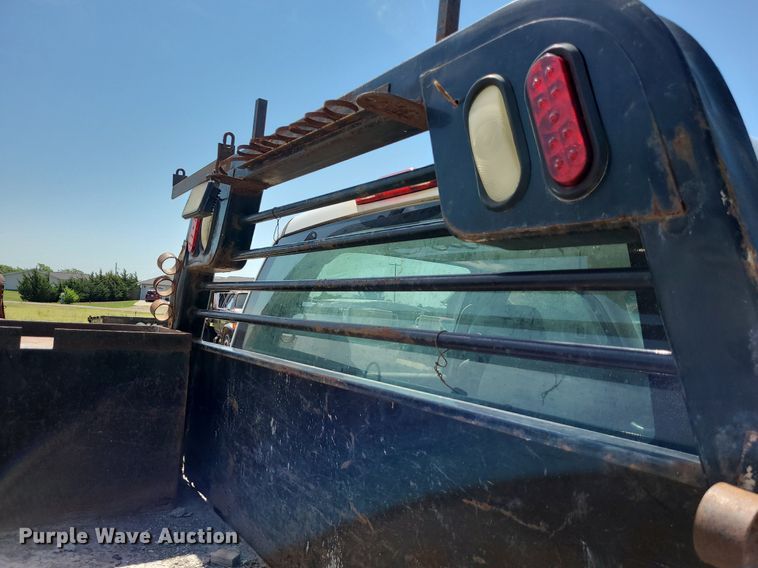 image for item NX9626 2012 Chevrolet Silverado 3500HD  Crew Cab flatbed pickup truck