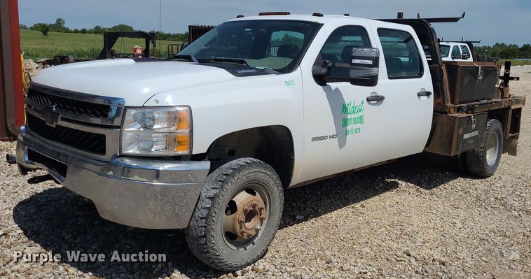 image for item NX9627 2012 Chevrolet Silverado 3500HD  Crew Cab flatbed pickup truck