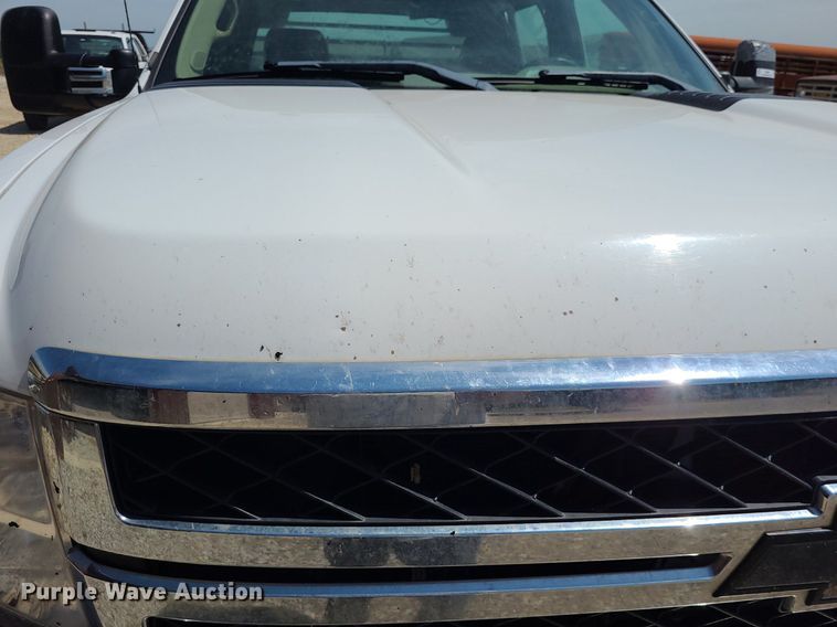 image for item NX9627 2012 Chevrolet Silverado 3500HD  Crew Cab flatbed pickup truck