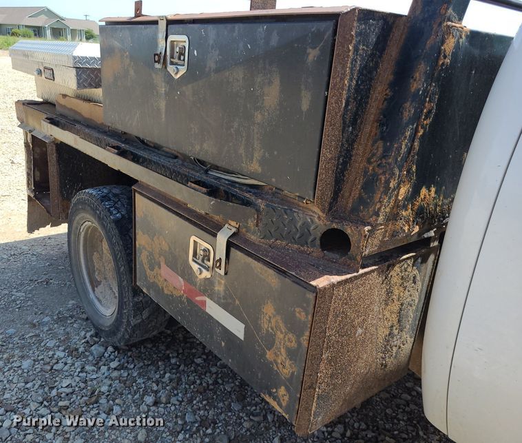 image for item NX9627 2012 Chevrolet Silverado 3500HD  Crew Cab flatbed pickup truck