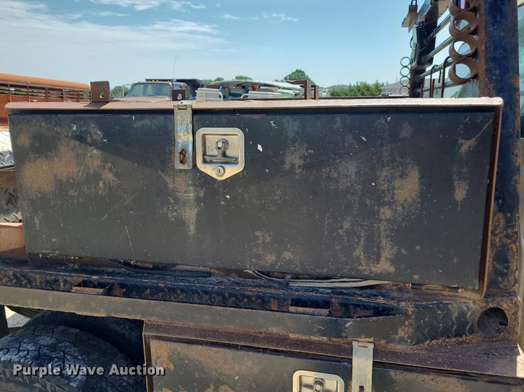 image for item NX9627 2012 Chevrolet Silverado 3500HD  Crew Cab flatbed pickup truck