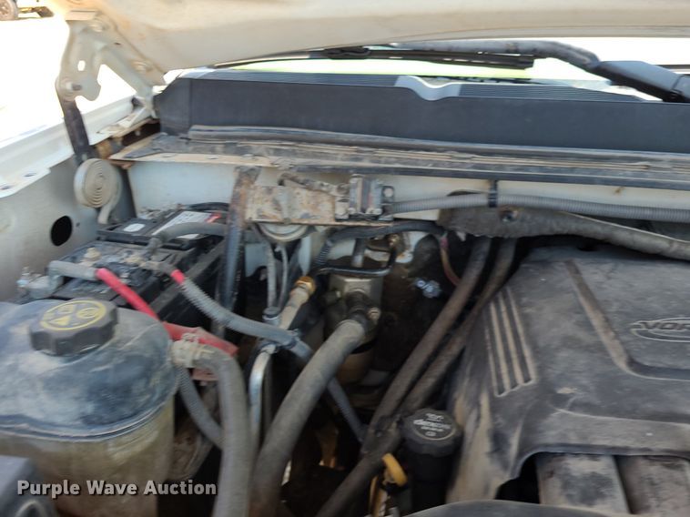 image for item NX9627 2012 Chevrolet Silverado 3500HD  Crew Cab flatbed pickup truck