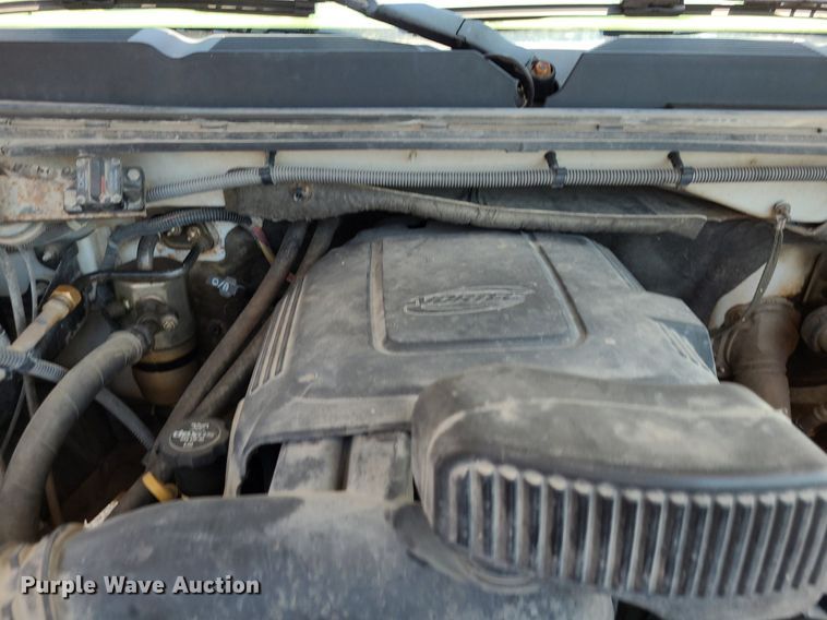 image for item NX9627 2012 Chevrolet Silverado 3500HD  Crew Cab flatbed pickup truck