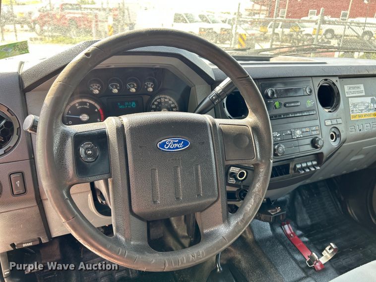 image for item OK9634 2015 Ford F550 Super Duty XL crew cab chipper truck