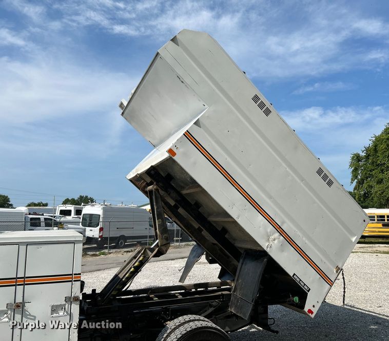 image for item OK9634 2015 Ford F550 Super Duty XL crew cab chipper truck