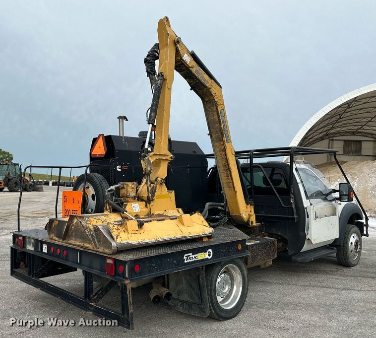 image for item DO5115 2015 Ford F550 Super Duty  flatbed truck with side boom mower
